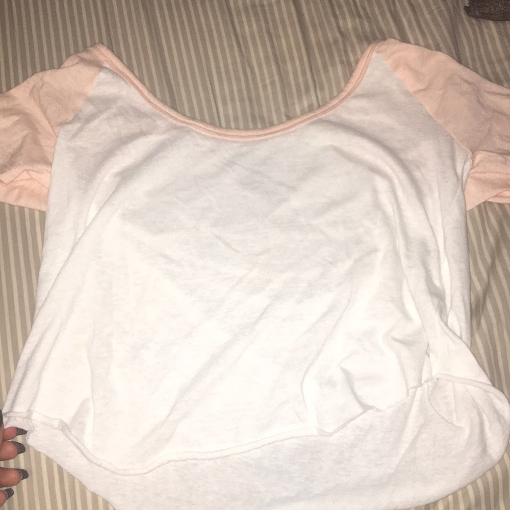 A white and light pink crop top from PacSun